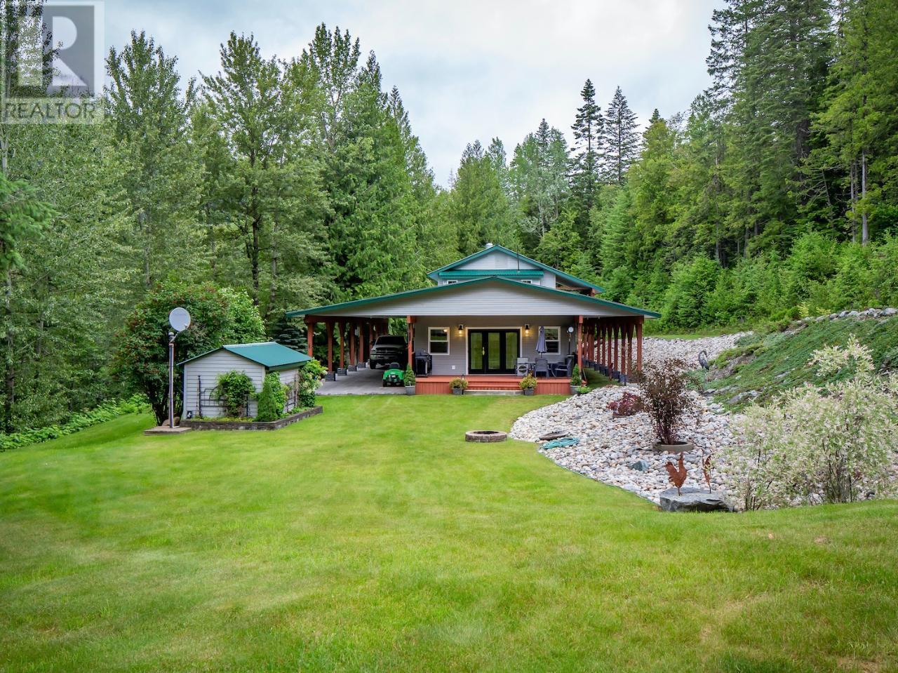<div class="slider-price">$859,000</div><p>1160 22 Highway, Rossland, British Columbia</p>