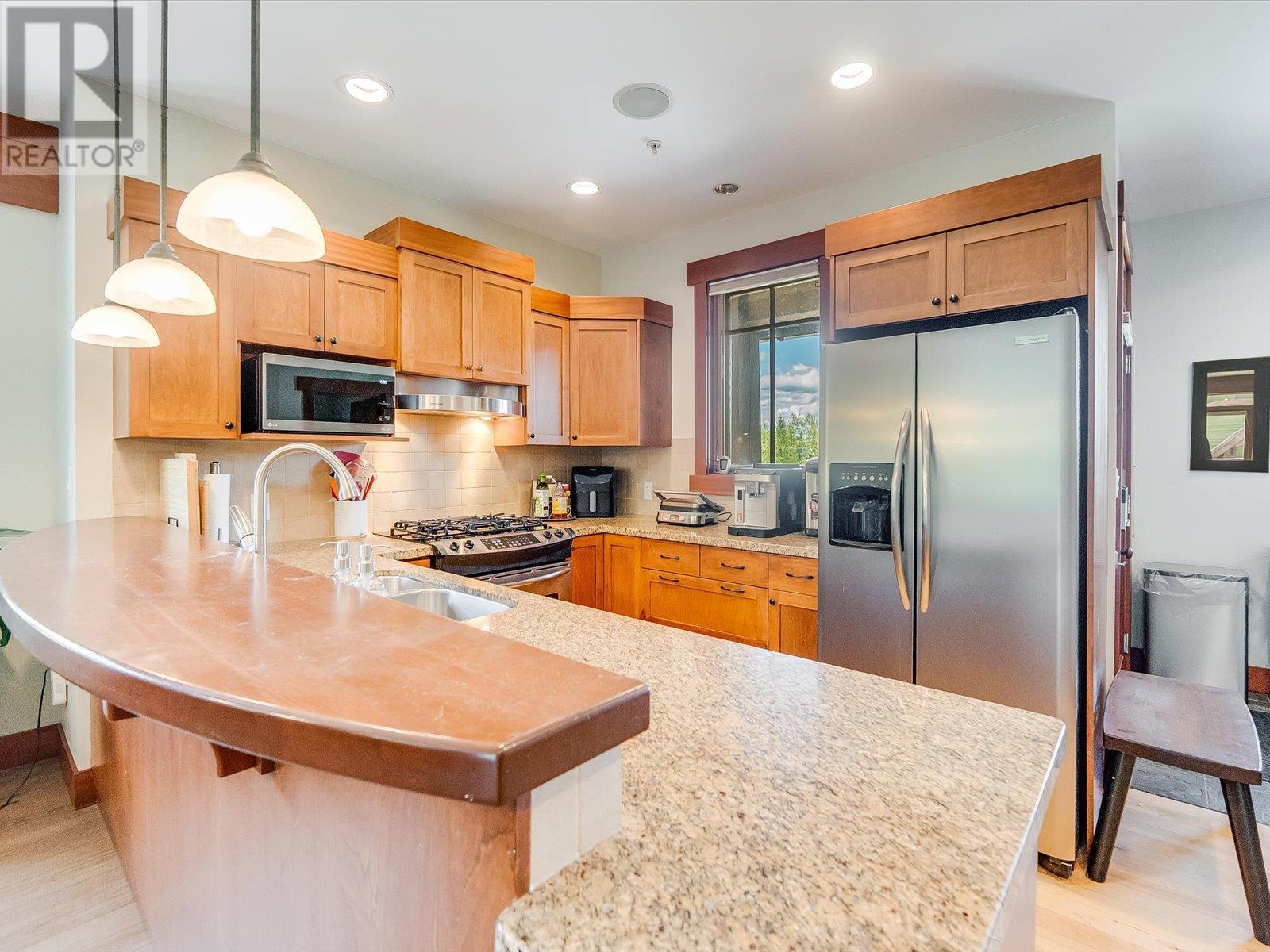 1002 Creekside Terrace Unit# A, Rossland, British Columbia  V0G 1Y0 - Photo 2 - 10349779